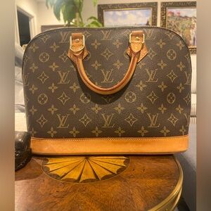 Louis Vuitton Retail $1,530 Monogram Alma PM